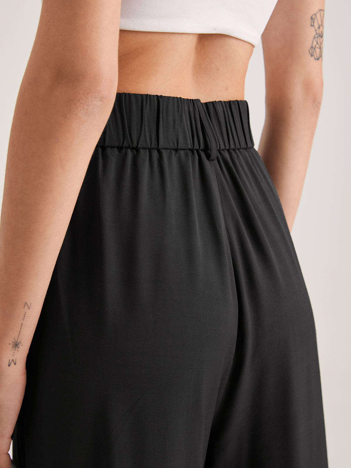 Nadia – Hohe-taillierte Faltenhose